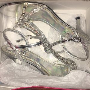 I’m selling a of Silver Slippers